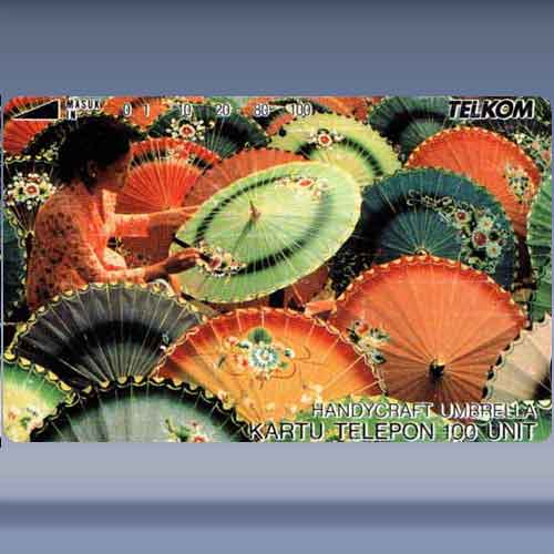 Woman paints Umbrellas